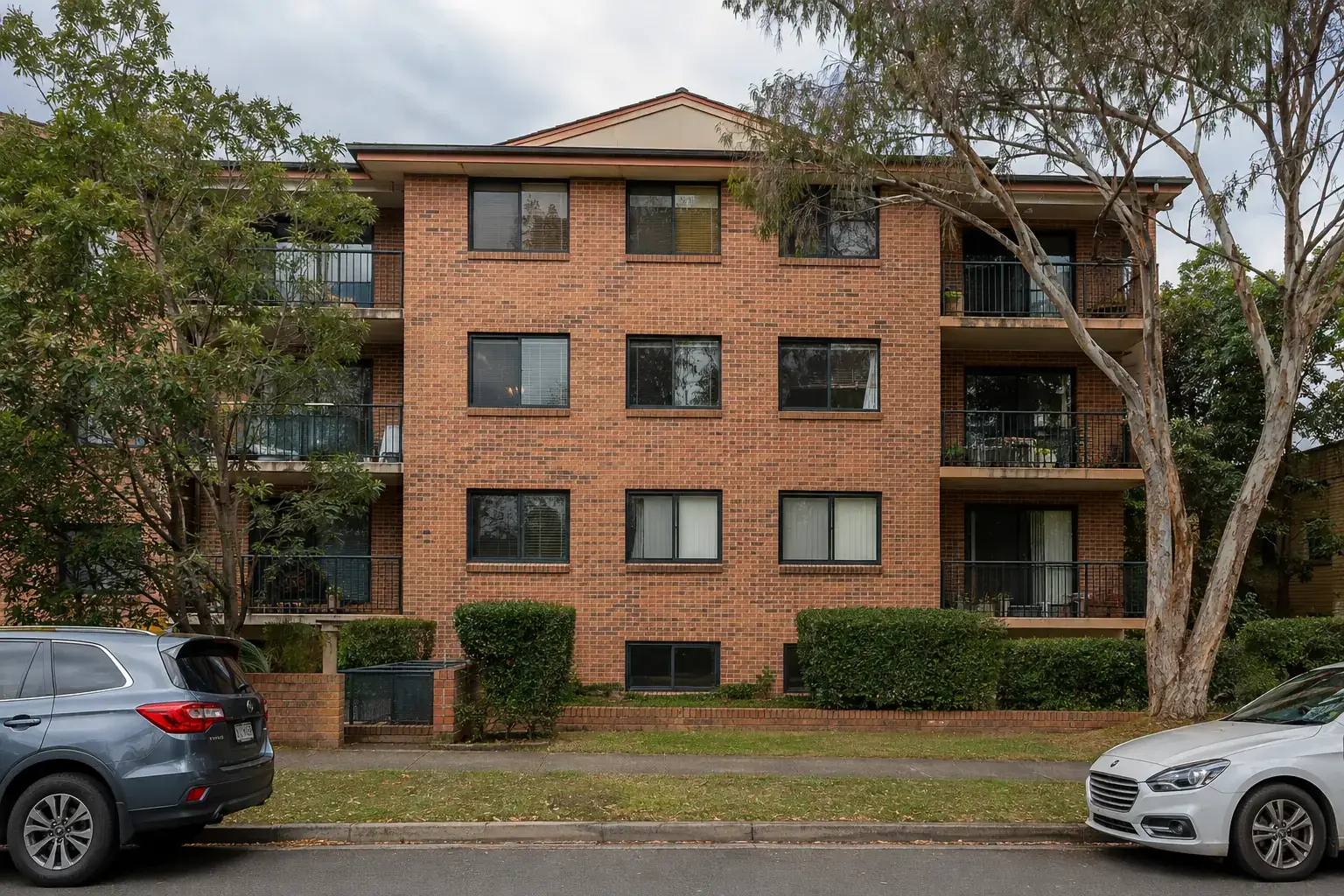 Sydney brick apartment building with consistent aluminium window frames
